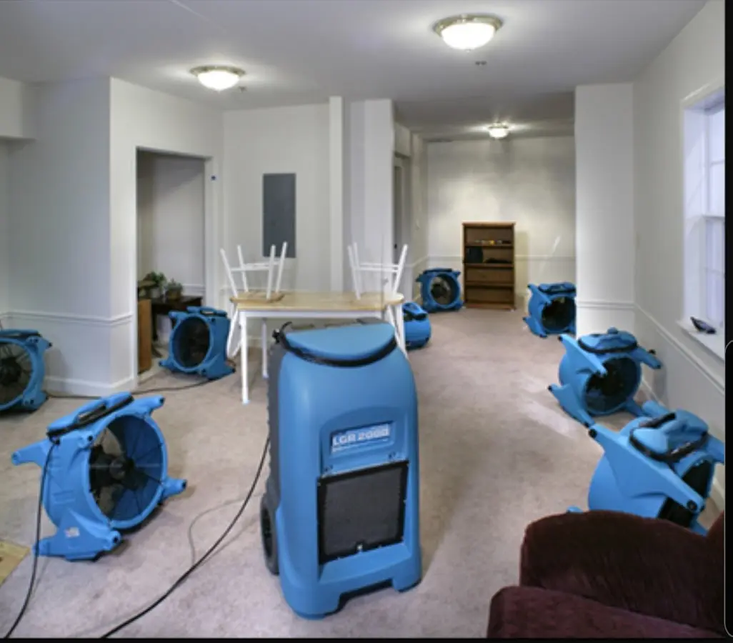 Air movers and dehumidifier setup for Water Damage Restoration in Cottage Grove
